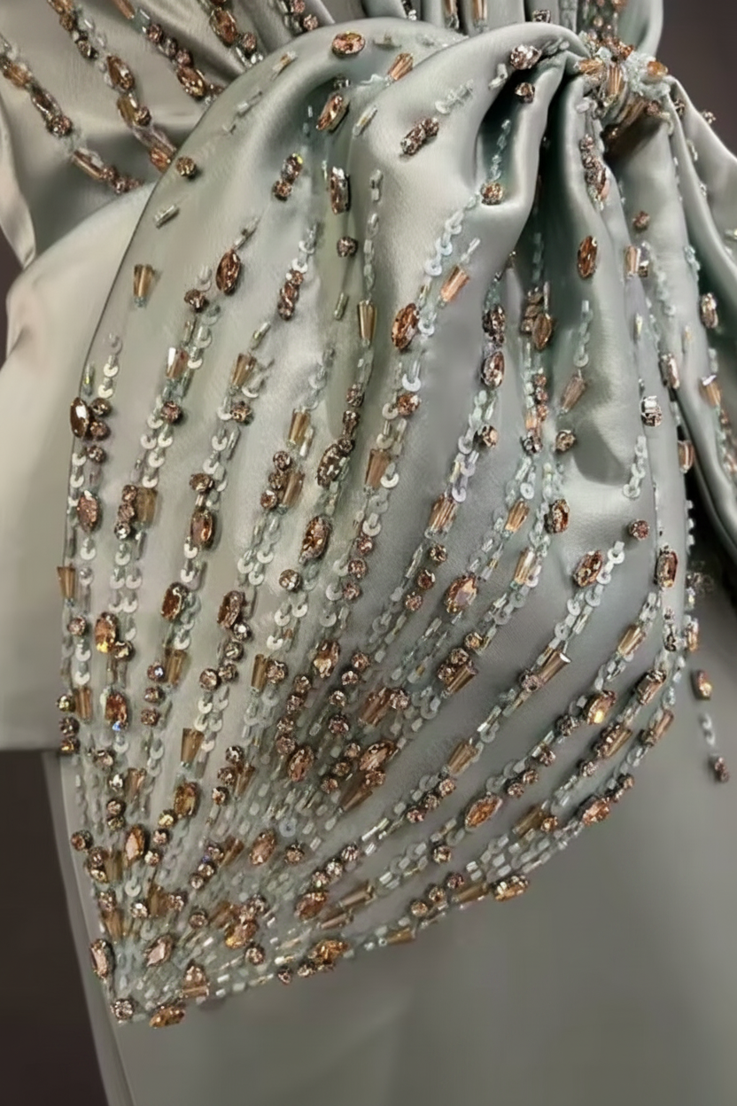 A Pale Mint Green Halter Evening Gown with Crystal-Style Waist Detail LLUXE A Pale Mint Green Halter Evening Gown with Crystal-Style Waist Detail LLUXE