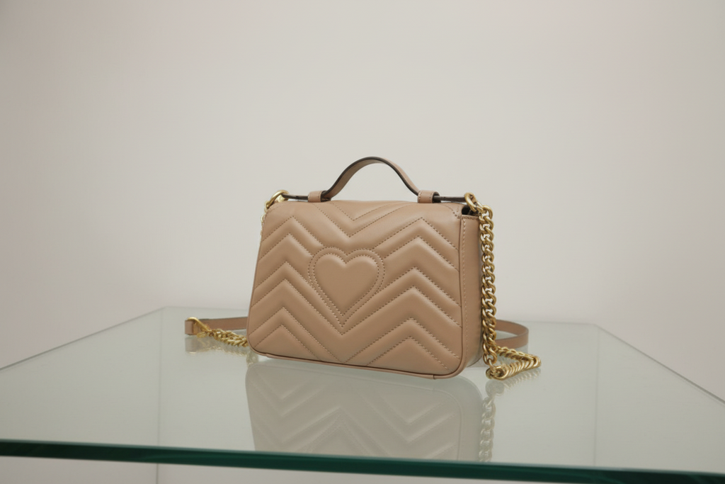 Gucci GG Marmont Mini Top Handle Bag Dusty Pink Leather Antique Gold Hardware Previously Owned Authentic