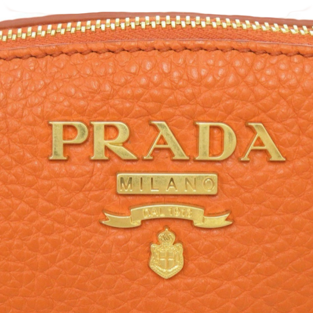 Prada Orange Leather Cosmetic Pouch Gold Hardware Previously Owned Authentic
