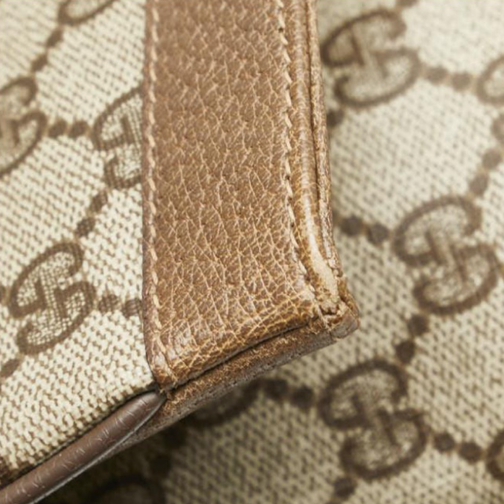 Old Gucci GG Supreme clutch Authentic Previously Owned